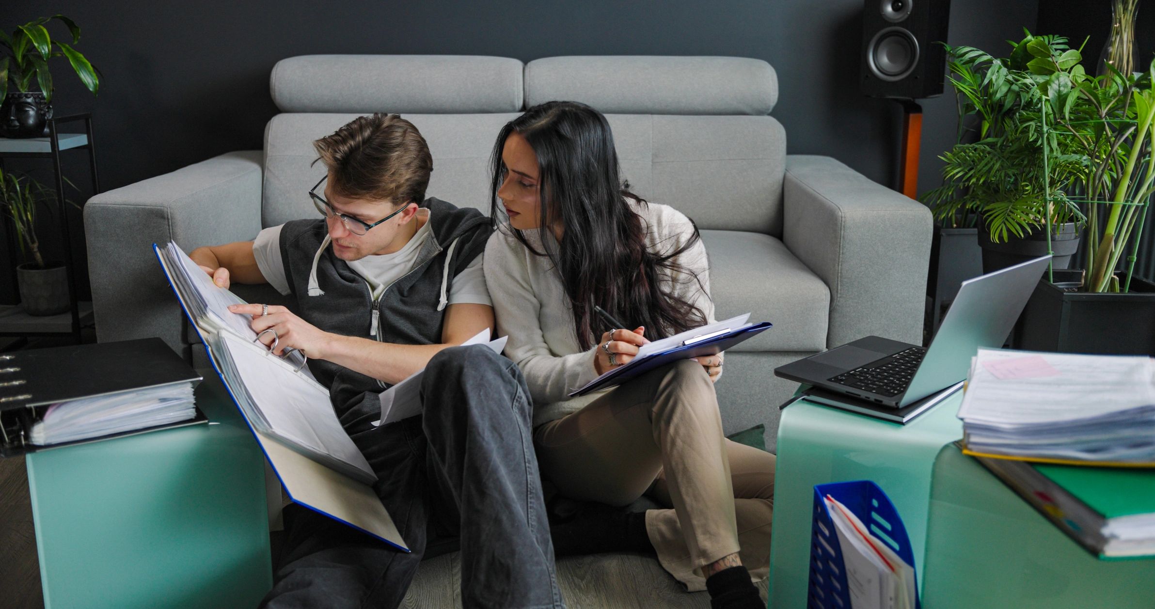 Couple reviewing household financial documents